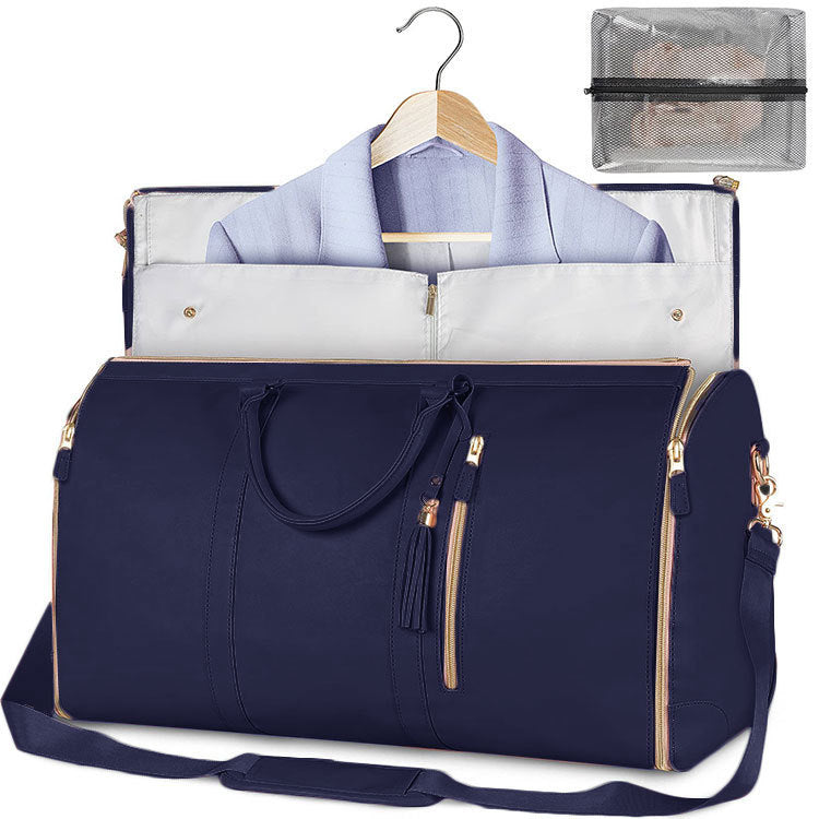 Navy blue travel bag with a white garment inside, on a white background