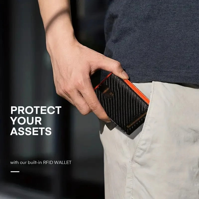Person placing a carbon fiber pattern RFID wallet into a front pocket for everyday carry.